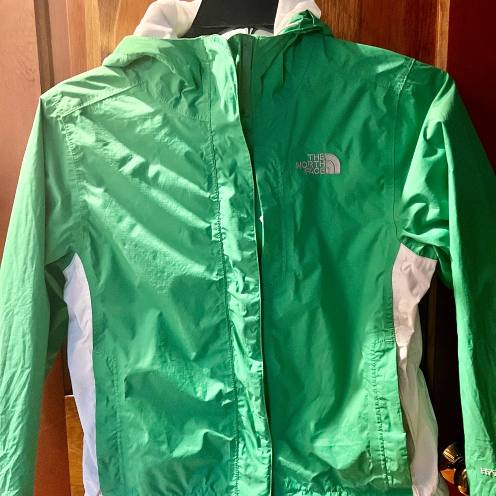 Northface lightweight raincoat with hood.